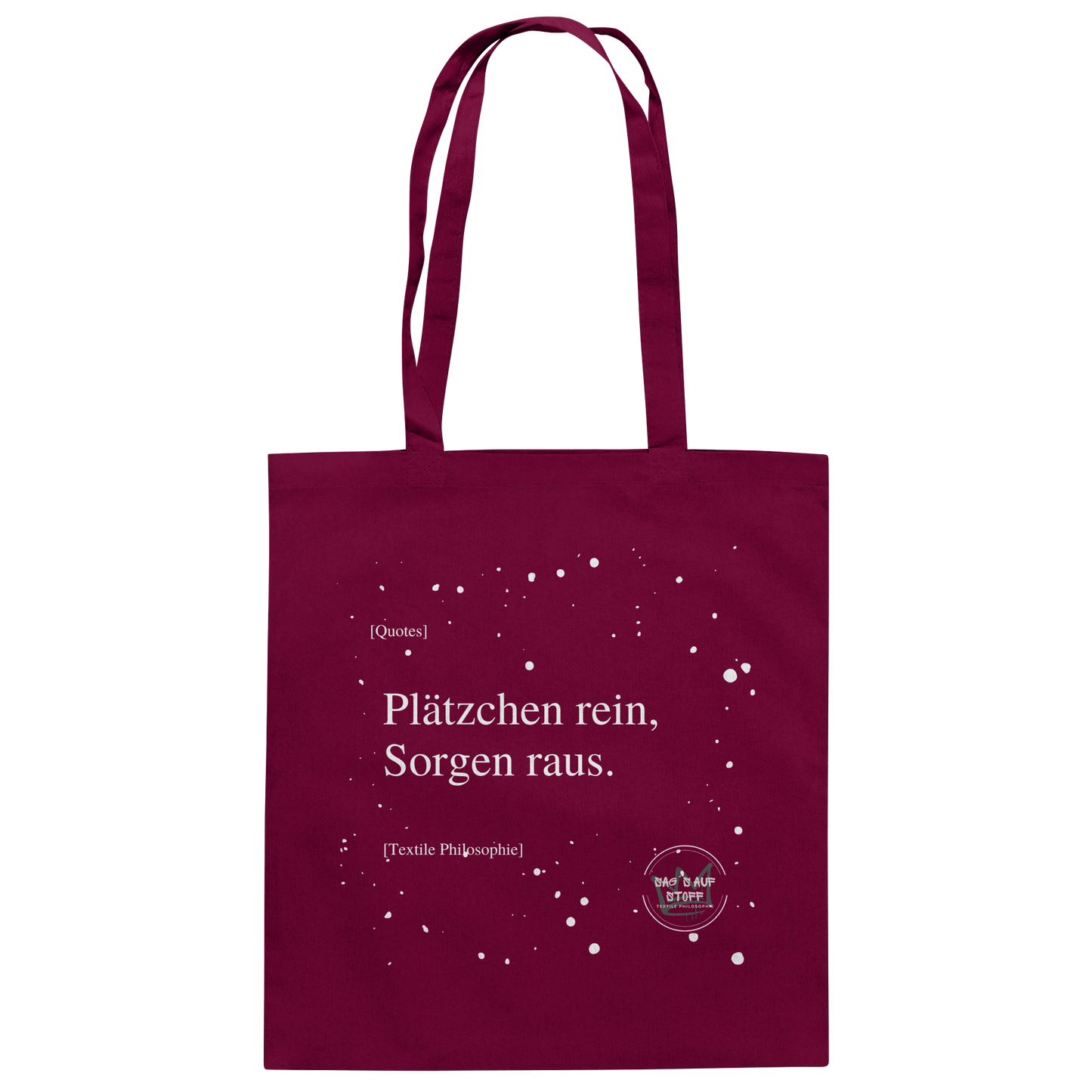Roter Jutebeutel von „Sag’s auf Stoff“ mit weißer Aufschrift "Plätzchen rein, Sorgen raus.", Weißen Schneeflocken im Hintergrund und Logo "Sag´s auf Stoff". Perfekt als Geschenk.