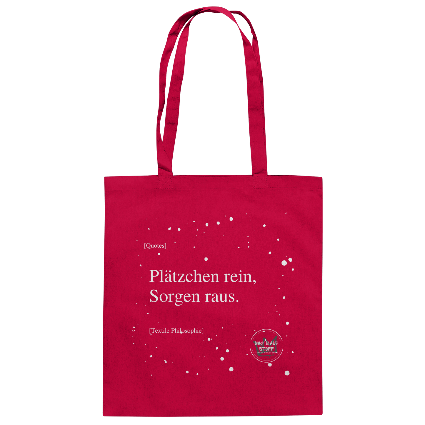 Roter Jutebeutel von „Sag’s auf Stoff“ mit weißer Aufschrift "Plätzchen rein, Sorgen raus.", Weißen Schneeflocken im Hintergrund und Logo "Sag´s auf Stoff". Perfekt als Geschenk.