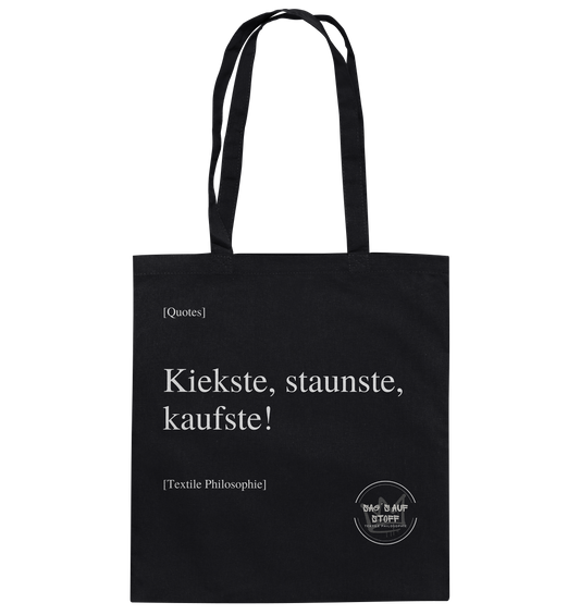 Schwarzer Jutebeutel mit weißer Aufschrift "Kiekste, staunste, kaufste!" und Logo "Sag´s auf Stoff"