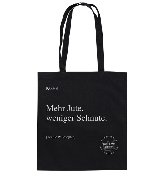 Schwarzer Jutebeutel mit weißer Aufschrift "Mehr Jute, weniger Schnute." und Logo "Sag´s auf Stoff"