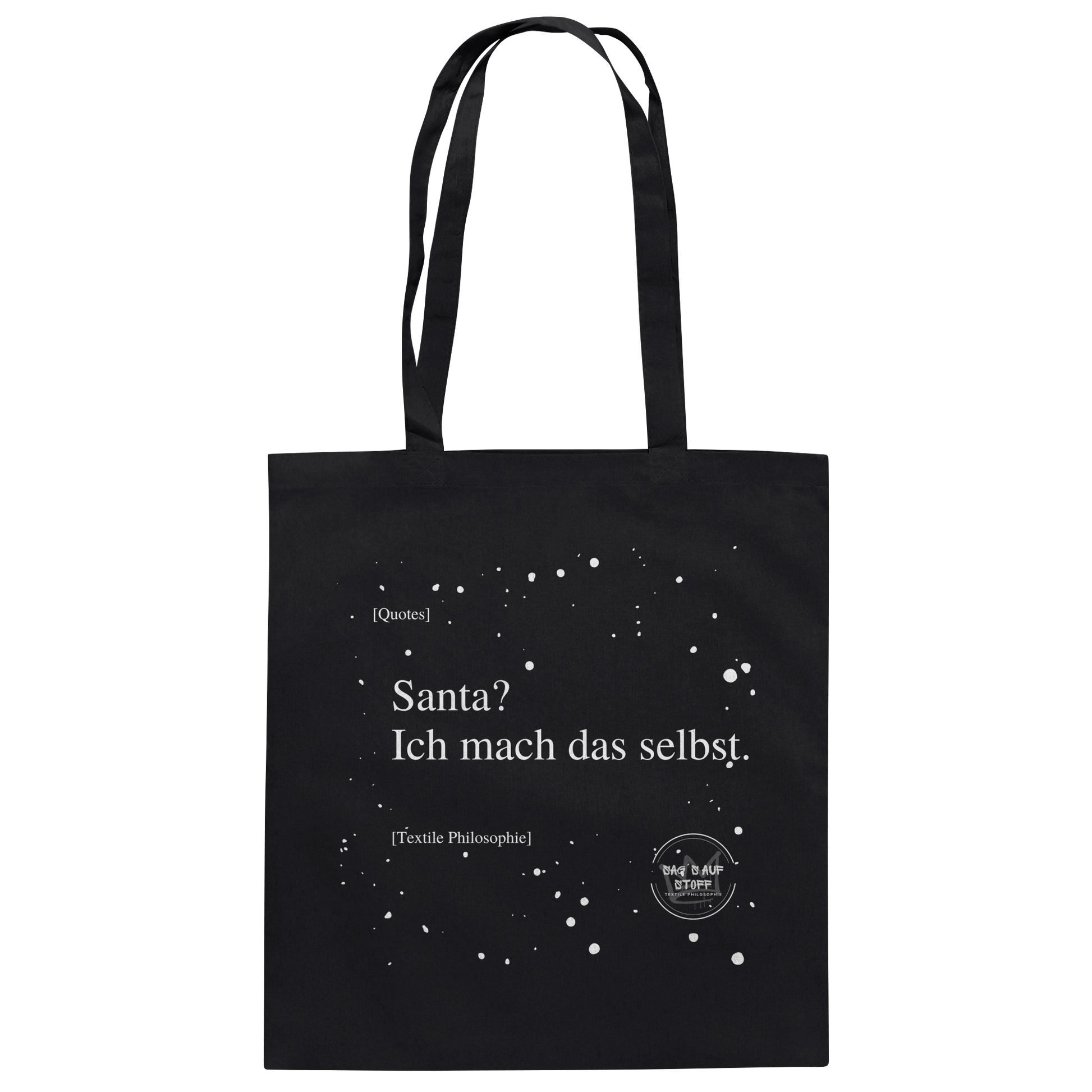 Schwarzer Jutebeutel von „Sag’s auf Stoff“ mit weißer Aufschrift "Santa? Ich mach das selbst.", Weißen Schneeflocken im Hintergrund und Logo "Sag´s auf Stoff". Perfekt als Geschenk.