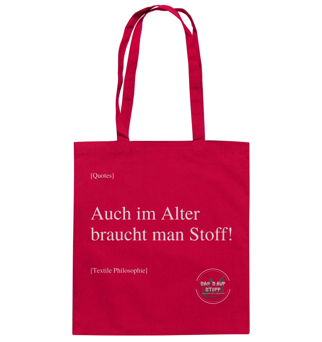 Roter Jutebeutel mit weißer Aufschrift "Auch im Alter braucht man Stoff" und Logo "Sag´s auf Stoff"