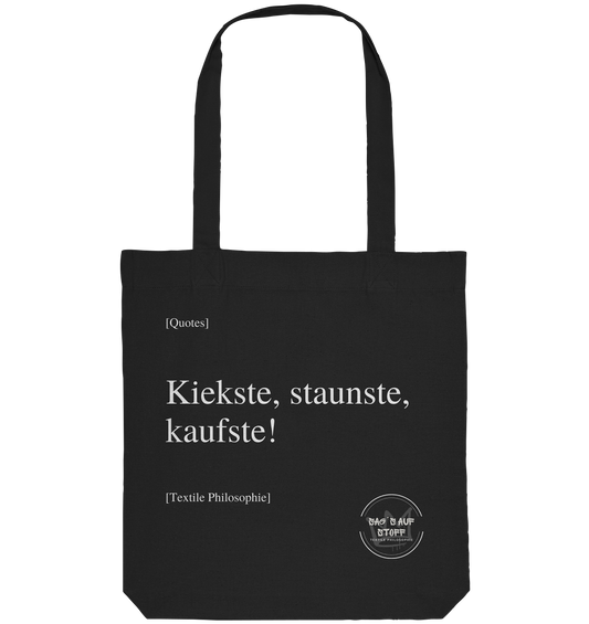 Schwarzer Jutebeutel mit weißer Aufschrift "Kiekste, staunste, kaufste!" und Logo "Sag´s auf Stoff"
